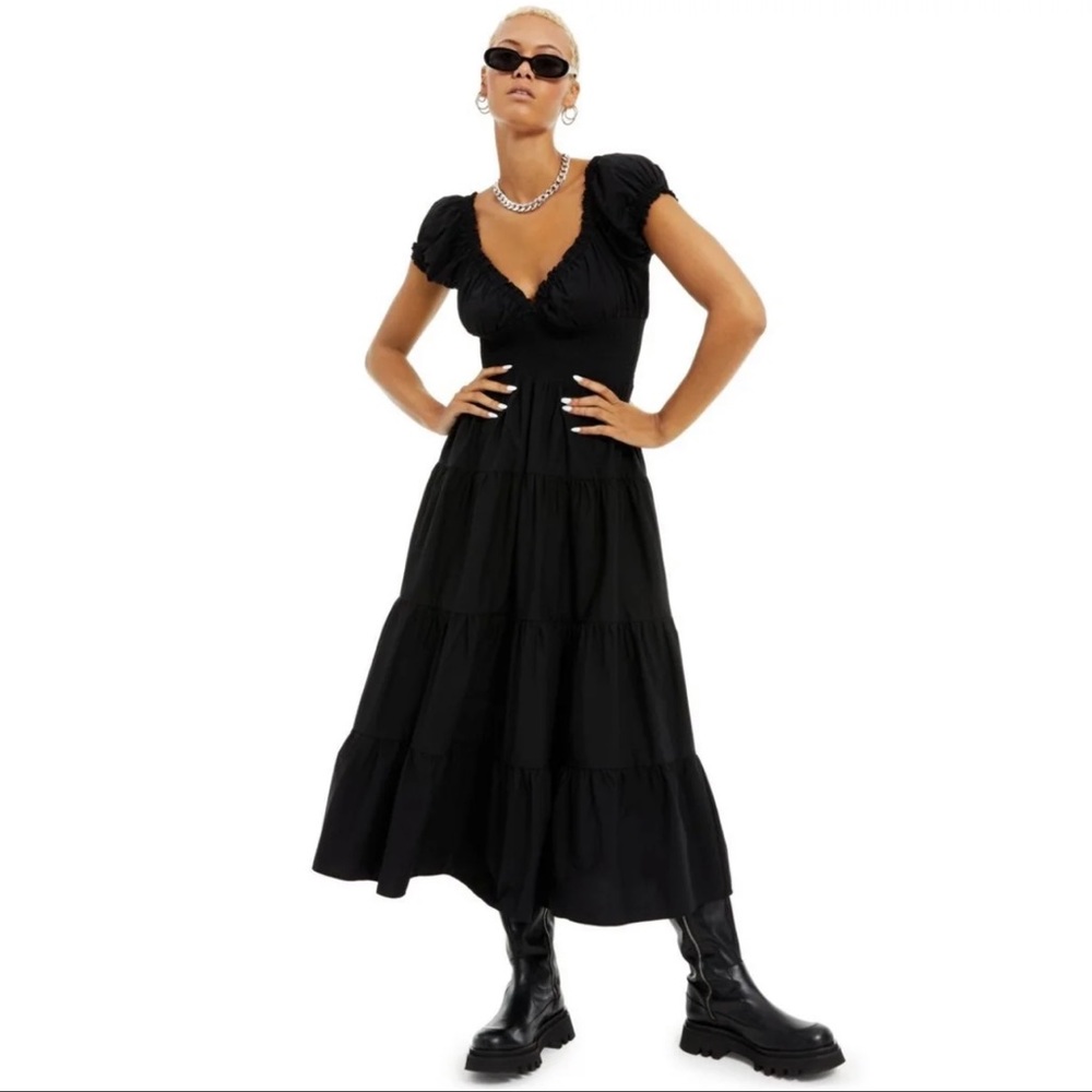 Danielle Bernstein black midi dress.